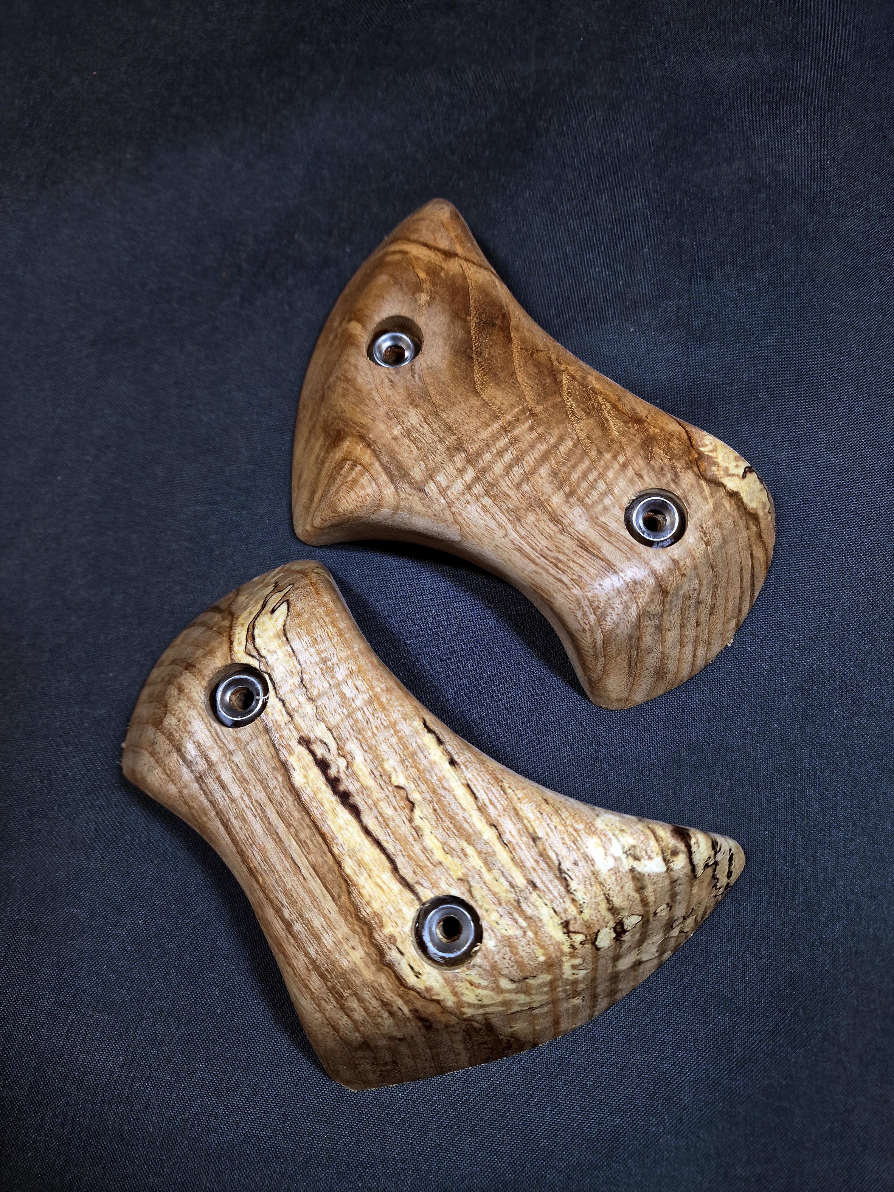 Curved pinches in Ash